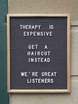 Funny hair salon sign suggesting haircuts over therapy for listening.